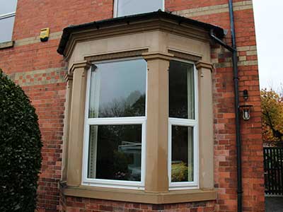 Reconstructed Stone Bay comprising, Cills, Mullions  and Capitols, Detailed Heads and Cornice